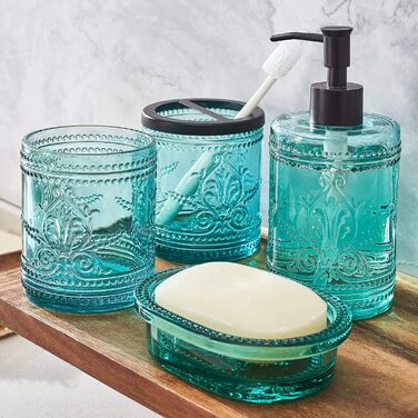 4-piece glass bathroom accessory set with decorative pressed pattern, including soap dispenser, tumbler, soap dish, and toothbrush holder, blue-green
