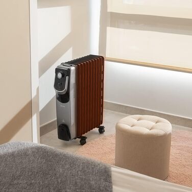 Масляний радіатор Cecotec ReadyWarm 11000 Space 360º Black - 2500 Вт, 11 секцій, 3 режими, з термостатом, колесами, зручним керуванням та системою безпеки. Для приміщень до 28 м²