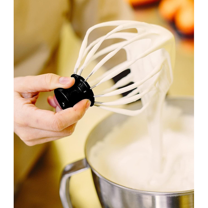 Stand mixer with bowl for cakes and bread with baking accessories. Various models also include a meat grinder and blender. 16746