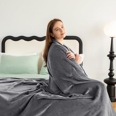 Плед WAVVE: теплий та м'який плед з флісу 150x200 см, сірий колір. Ідеально для дивану та відпочинку.