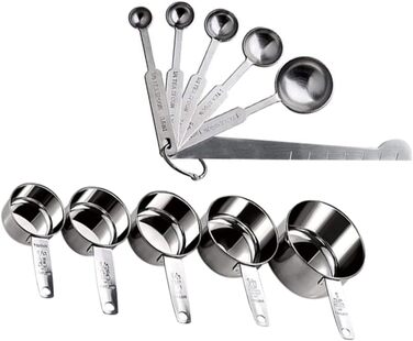 2 Measuring spoons, baking, kitchen machine, cookware, kitchenware, cookrings, saucer, kitchen scales, measuring cup, measuring spoons (scaled, graduated), stainless steel, silver.