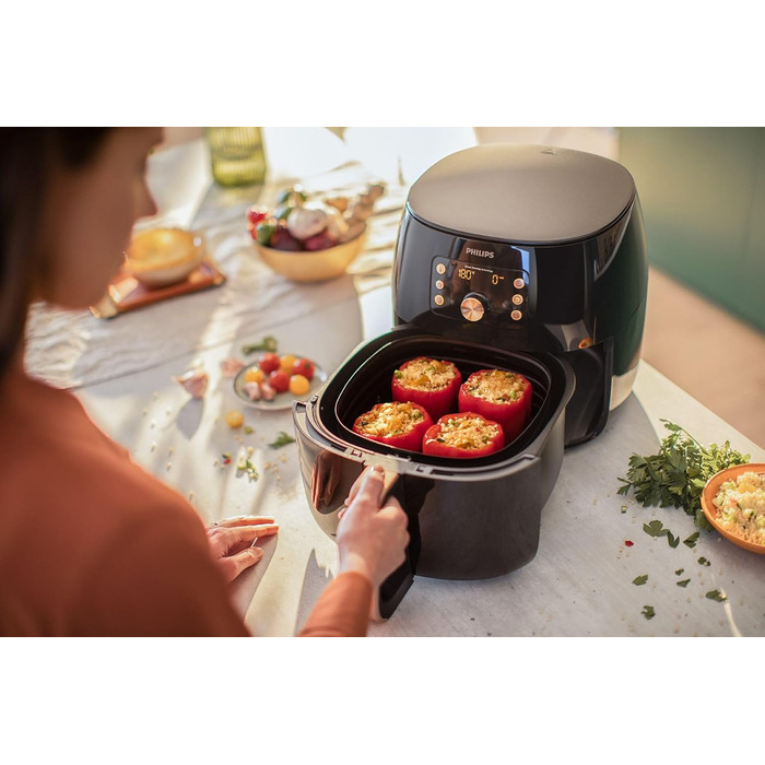 Philips Airfryer XXL with Rapid Air Technology - Hot Air Fryer with 7.3L Capacity, 90% Less Fat, Smart Sensing for Perfect Results, QuickClean, Recipe App, Black/Copper (HD9867/90)