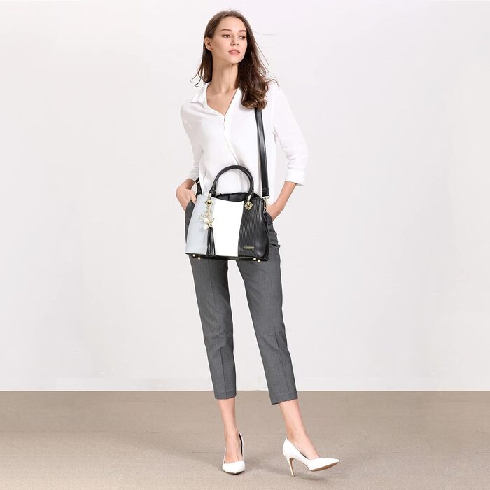 Сумка Pomelo Best жіноча багатокольорова смугаста через плече з внутрішніми кишенями (Чорно-біла)