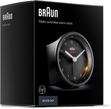 Classic analog radio alarm clock by Braun for the Central European Time Zone (CET/GMT+1) with snooze function and light, quiet movement, crescendo alarm in black, model BC07B-DCF