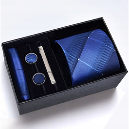 Набір аксесуарів для чоловіків: шовкова краватка, затискач та кишенкова хустка — вибір для справжнього джентльмена