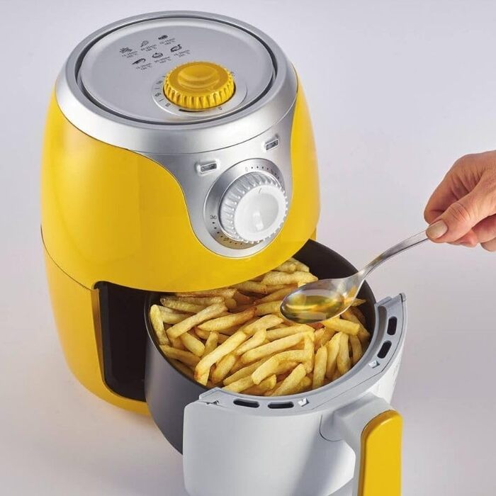 Фритюрниця Ariete 4615 Airy Fryer Mini 2 л, 1000 Вт, жовта, з антипригарним покриттям, температура до 200°C, знімна чаша, книга рецептів німецькою
