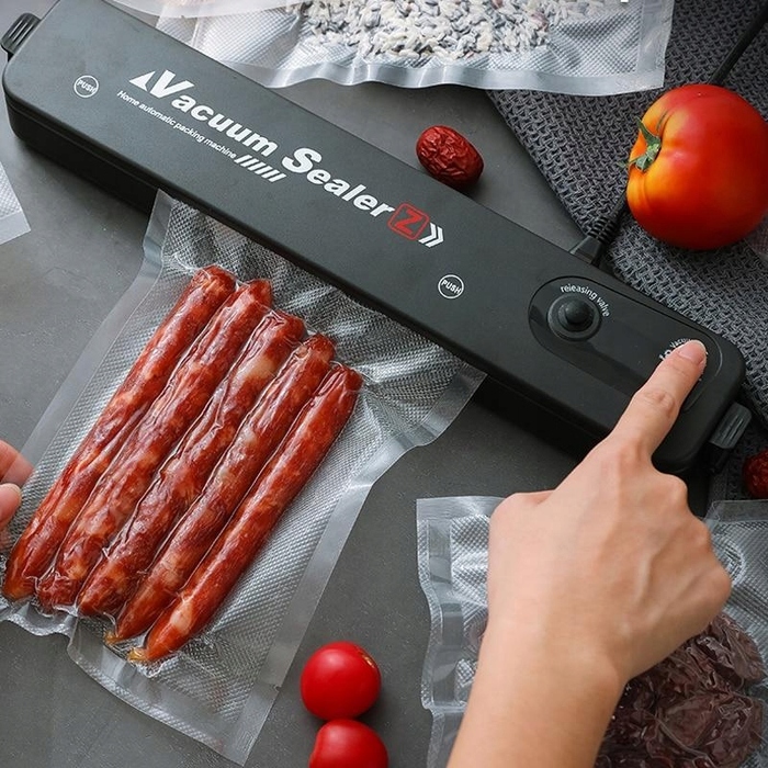 ВАКУУМНИЙ ПАКЕТУВАЛЬНИК ДЛЯ ПРОДУКТІВ ХАРЧУВАННЯ