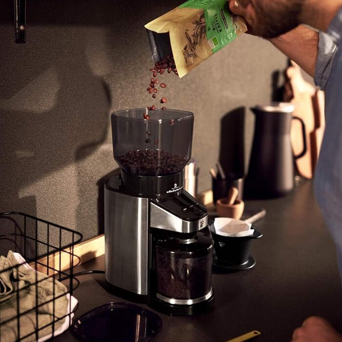 Електрична кавомолка Tchibo з вбудованими вагами, з нержавіючої сталі, конічні жорна, 26 ступенів помолу, чорно-срібна