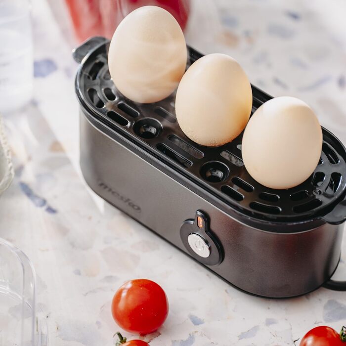 Електричний яйцеварка Mesko MS 4485: 1-3 яйця, напівтверді/тверді, режим приготування, мірний стакан, індикатор, автовимкнення