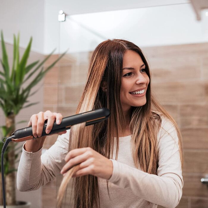Випрямляч для волосся GRUNDIG Naturashine HS 7030: 6 температурних режимів, іонізація, повна кераміка, захист волосся, чорний/рожеве золото