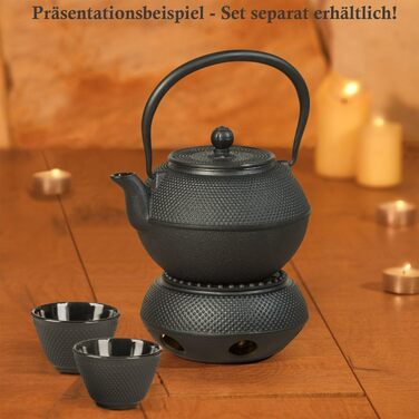 Cast iron tea warmer with textured surface
