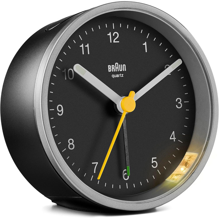 Classic Braun analog alarm clock with snooze function and light, quiet quartz movement, crescendo alarm in black and silver, model BC12SB