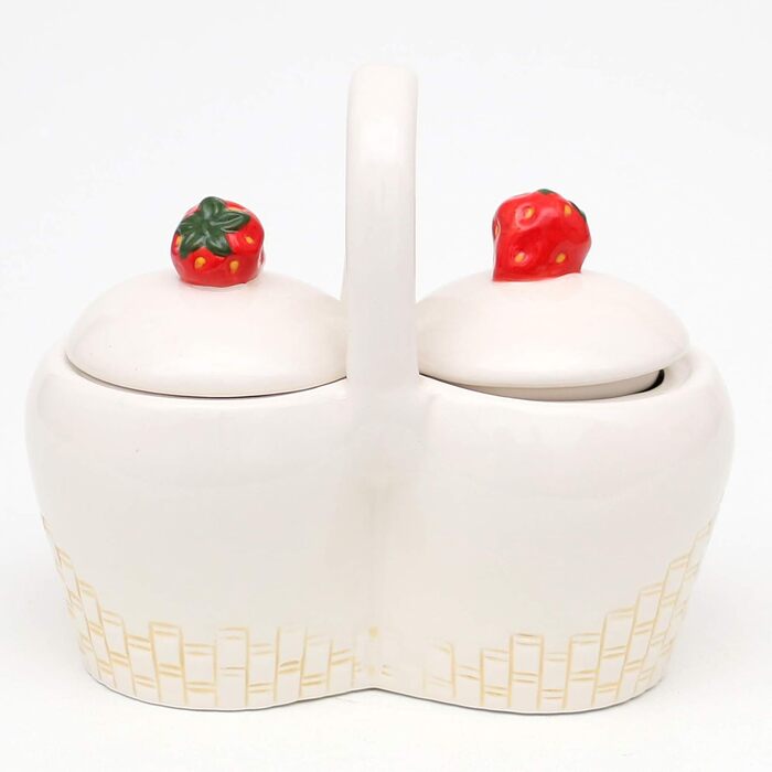 Dolomite sugar bowl with strawberry relief, size approximately 16.5 x 9.7 x 14 cm, 14
