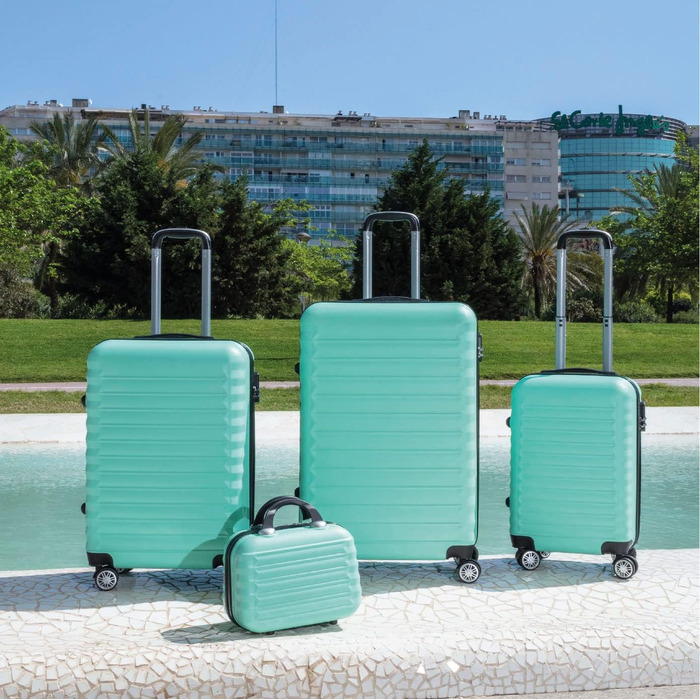 Набір валіз NUMADA 4 шт. (75см, 63см, 53см, культиватор), ABS, міцний, мінтовий