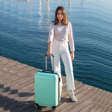 Набір валіз NUMADA 4 шт. (75см, 63см, 53см, культиватор), ABS, міцний, мінтовий