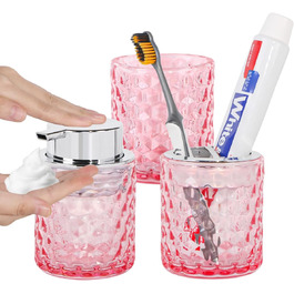 Pink bathroom accessory set made of glass, including a toothbrush holder, soap dispenser, and cup, a foaming soap dispenser, and a toothbrush holder, 3 pink bathroom cups for brush, toothpaste.
