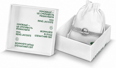 Браслет Lacoste MetroPole з застібкою-кнебелем. З візерунком petit piqué. Нержавіюча сталь, посріблений, для чоловіків та жінок