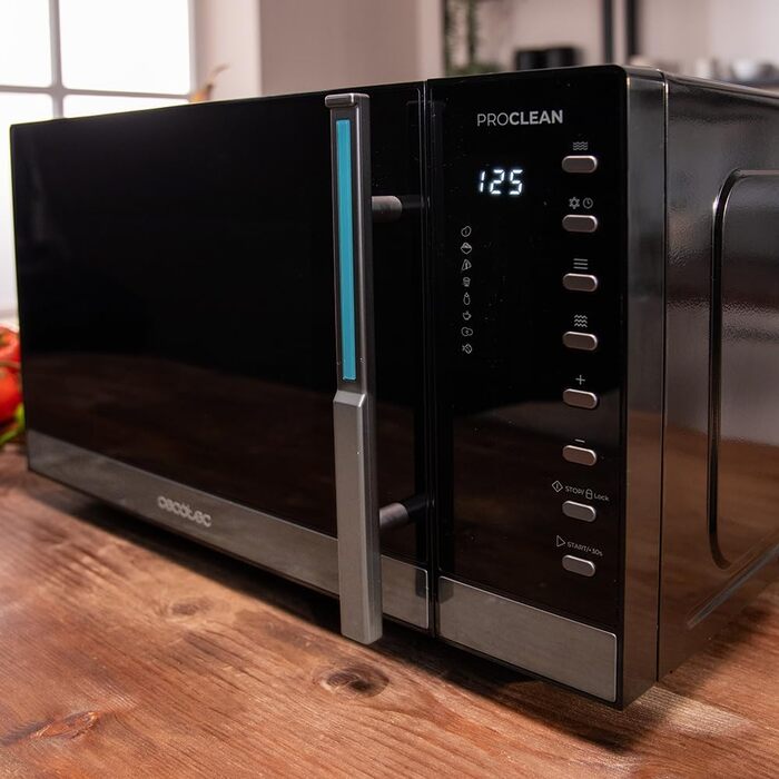 Мікрохвильова піч Cecotec Proclean 5130 з грилем, 23 л, 800/1000 Вт, рівномірне приготування, 5 рівнів потужності, функція розморожування, таймер 60 хв, діаметр обертового столу 285 мм