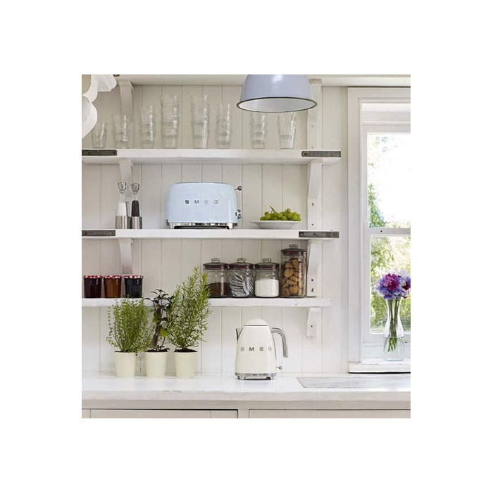 Тостер Smeg TSF02PBEU - 2 слоти для 4 тости, 6 рівнів підсмажування, функція підігріву, розморожування та приготування багелів, знімний піддон, 1500W, пастельно-блакитний