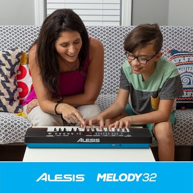 Alesis Melody 54 - Портативна клавіатура з 54 клавішами, вбудованими динаміками, 300 звуками, 300 ритмами, 40 демо-піснями, навчальними інструментами, мікрофоном та підставкою для нот (32 клавіші)