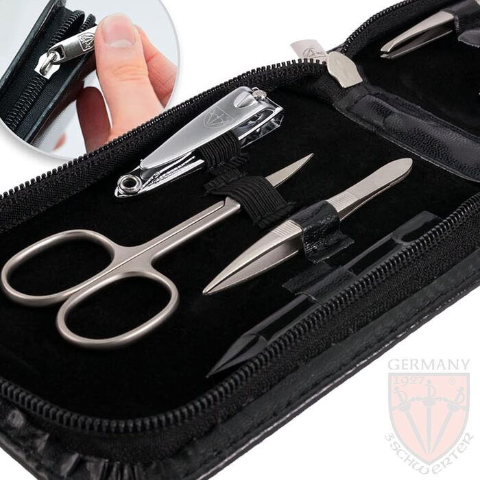 Набір для догляду за нігтями DREI SCHWERTER 'Novara' - 8 предметів. Чорний кейс з штучної шкіри. Містить: ножиці для нігтів, стекляна пилка, ножиці для кутикули, пінцет, кусачки для нігтів та інше. Чорний, матові інструменти