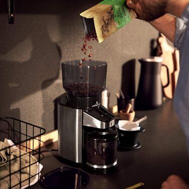 Електрична кавомолка Tchibo з вбудованими вагами, з нержавіючої сталі, конічні жорна, 26 ступенів помолу, чорно-срібна