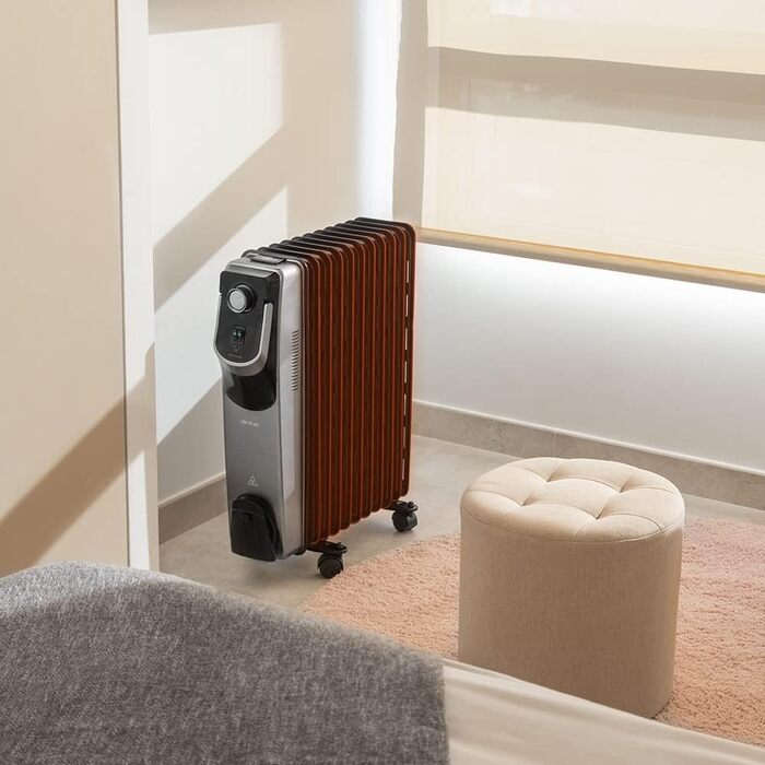 Масляний радіатор Cecotec ReadyWarm 11000 Space 360º Black - 2500 Вт, 11 секцій, 3 режими, з термостатом, колесами, зручним керуванням та системою безпеки. Для приміщень до 28 м²