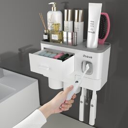 I have toothbrush holders for bathroom decor, 2 cup toothbrush holders wall-mounted with toothpaste dispenser, bathroom accessories with a large-capacity tray, and a cosmetic drawer.